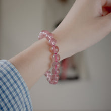 Load image into Gallery viewer, Beautiful Strawberry Quartz Bracelet with shinny pink color. Everyone piece is unique. Best gift for your best friend/ BFF, birthday gift, valantine&#39;s day gift and daily wear. 天然草莓晶手鏈， 每一條都是獨一無二，草莓晶能提升愛情運，最佳的告白禮物，閨蜜禮物，生日及情人節禮物。彈力線設計，可調節長度，簡單易佩搭，適合日常配戴。
