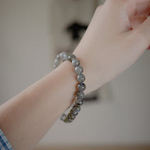 Load image into Gallery viewer, Beautiful Natural Labradorite stone Bracelet with shinny smoky color. Everyone piece is unique. Best gift for your best friend/ BFF, birthday gift, valantine&#39;s day gift and daily wear. 天然拉長石， 每一條都是獨一無二閃藍光幻彩，拉長石能提升愛情運，感壓力及令人平和的力量，最佳的節日禮物，閨蜜禮物，生日及情人節禮物。彈力線設計，可調節長度，簡單易佩搭，適合經常配戴。
