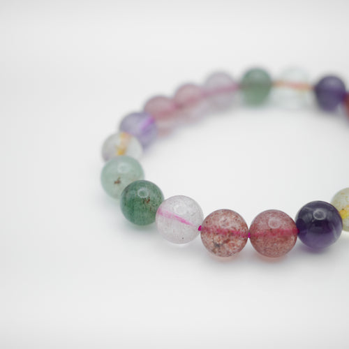 Mixed Quartz Bracelet with beautiful mixed quartz color. Everyone piece is unique. Best gift for your best friend/ BFF, birthday gift, valantine's day gift and daily wear. 天然超七手鏈， 每一條都是獨一無二混合水晶配搭，能提升財富運及人緣，減壓力及令人平和的力量等多重功效，最佳的節日禮物，閨蜜禮物，生日及情人節禮物。彈力線設計，可調節長度，簡單高貴又易佩搭，適合經常配戴。