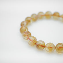 Load image into Gallery viewer, Natural Citrine Bracelet with beautiful yellow color. Everyone piece is unique. Best gift for your best friend/ BFF, birthday gift, Valantine&#39;s day gift and daily wear. 天然黃水晶手鏈， 每一條都是獨一無二深紫色色彩，黃水晶能提升財富運，感壓力及令人平和的力量，最佳的節日禮物，閨蜜禮物，生日及情人節禮物。彈力線設計，可調節長度，簡單易佩搭，適合經常配戴。
