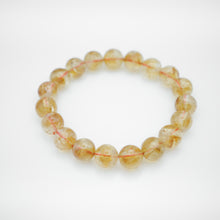 Load image into Gallery viewer, Natural Citrine Bracelet with beautiful yellow color. Everyone piece is unique. Best gift for your best friend/ BFF, birthday gift, Valantine&#39;s day gift and daily wear. 天然黃水晶手鏈， 每一條都是獨一無二深紫色色彩，黃水晶能提升財富運，感壓力及令人平和的力量，最佳的節日禮物，閨蜜禮物，生日及情人節禮物。彈力線設計，可調節長度，簡單易佩搭，適合經常配戴。
