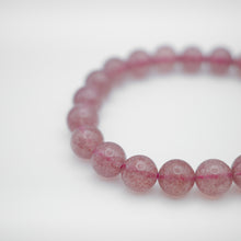 Load image into Gallery viewer, Beautiful Strawberry Quartz Bracelet with shinny pink color. Everyone piece is unique. Best gift for your best friend/ BFF, birthday gift, valantine&#39;s day gift and daily wear. 天然草莓晶手鏈， 每一條都是獨一無二，草莓晶能提升愛情運，最佳的告白禮物，閨蜜禮物，生日及情人節禮物。彈力線設計，可調節長度，簡單易佩搭，適合日常配戴。
