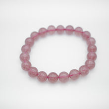 Load image into Gallery viewer, Beautiful Strawberry Quartz Bracelet with shinny pink color. Everyone piece is unique. Best gift for your best friend/ BFF, birthday gift, valantine&#39;s day gift and daily wear. 天然草莓晶手鏈， 每一條都是獨一無二，草莓晶能提升愛情運，最佳的告白禮物，閨蜜禮物，生日及情人節禮物。彈力線設計，可調節長度，簡單易佩搭，適合日常配戴。
