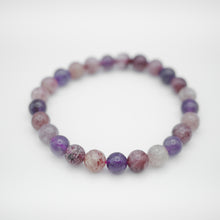 Load image into Gallery viewer, Strawberry Quartz&amp;Amethyst Bracelet with beautiful mixed quartz color. Everyone piece is unique. Best gift for your best friend/ BFF, birthday gift, valantine&#39;s day gift and daily wear. 天然草莓晶+紫水晶手鍊， 每一條都是獨一無二混合水晶配搭，能改善人際關係提升人緣，讓你思緒清晰等多重功效，最佳的節日禮物，閨蜜禮物，生日及情人節禮物。彈力線設計，可調節長度，適合天天配戴。
