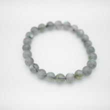 Load image into Gallery viewer, Beautiful Natural Labradorite stone Bracelet with shinny smoky color. Everyone piece is unique. Best gift for your best friend/ BFF, birthday gift, valantine&#39;s day gift and daily wear. 天然拉長石， 每一條都是獨一無二閃藍光幻彩，拉長石能提升愛情運，感壓力及令人平和的力量，最佳的節日禮物，閨蜜禮物，生日及情人節禮物。彈力線設計，可調節長度，簡單易佩搭，適合經常配戴。
