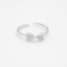 Load image into Gallery viewer, 925 sterling silver bow tie open ring with adjustable size.
childlike style,special day gift,glamorous sparkle,Everyday luxury,Perfect accessory.
925 純銀滿鑽領結開口戒 ，百搭日常奢華，高級質感，輕奢風格，浪漫禮物，復古童趣，交換禮物推薦。

